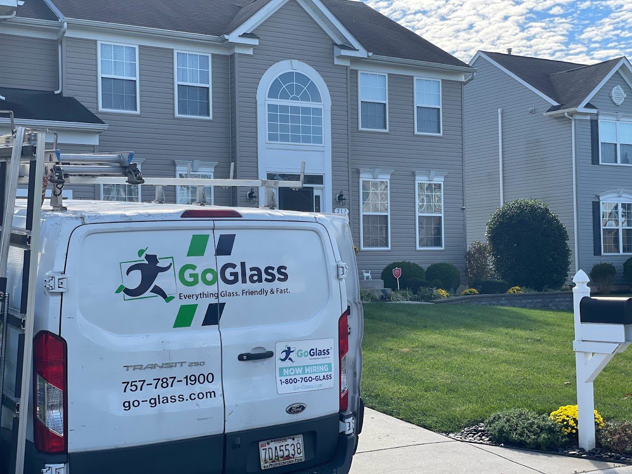 A GoGlass van is parked respectfully outside a home in Delmarva