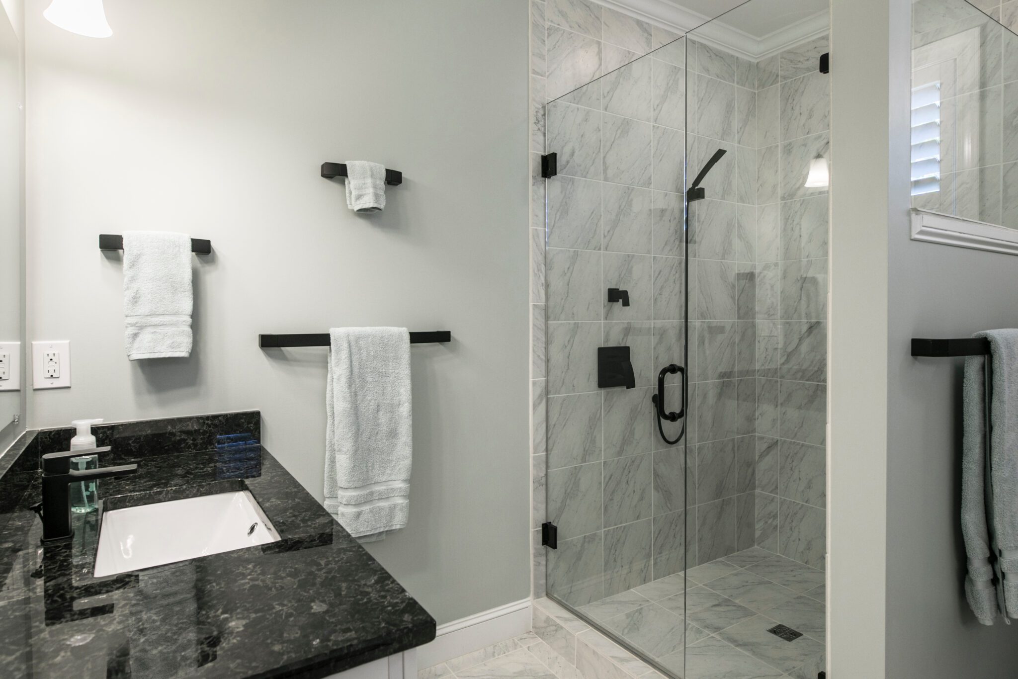Shower door glass with new tile shower