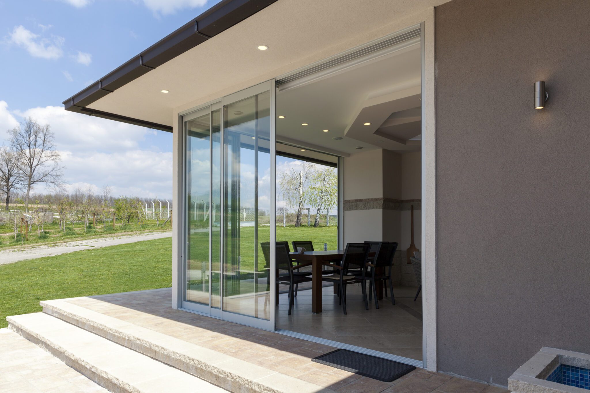 Patio sliding door with paver steps